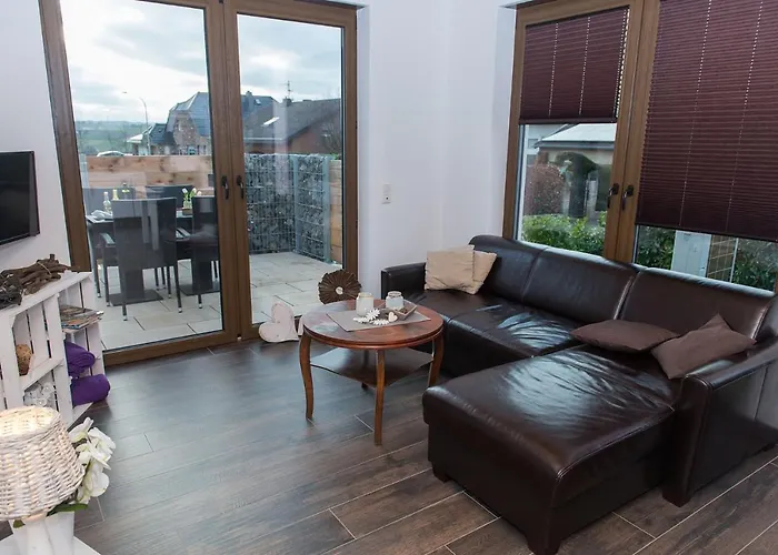 Апартаменты Moderne Ferienwohnung-seenaehe-terrasse-parkplatz-wallbox-fahrradparkplatz